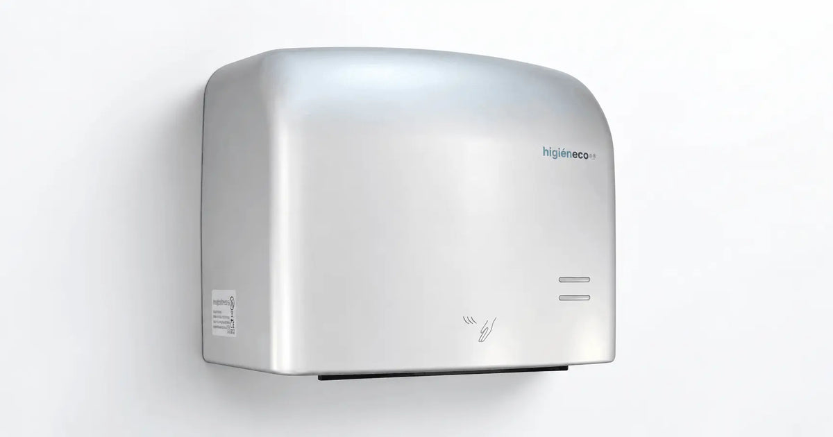 Commercial automatic hand dryer in a workplace washroom