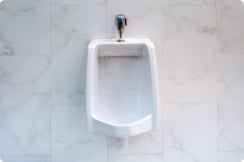 old-white-urinals-men-s-bathroom